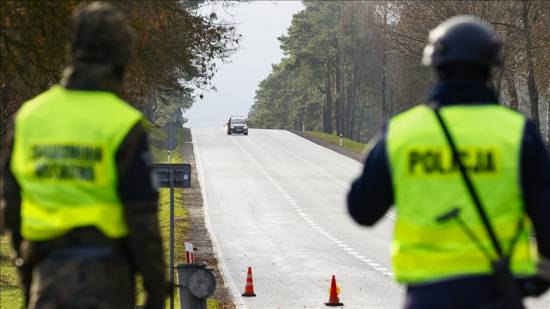 Poland detains 100 migrants after they cross Belarus&#039; border