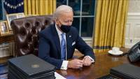 Biden signs raising debt limit, avoiding first default in US history