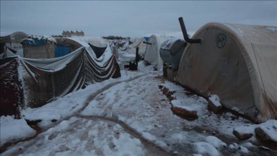 Snowfall brings down tents in northern Syria, leaving refugees out in the cold