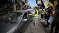 Palestinians celebrate the escape of 6 Palestinian detainees from “Israeli” prison by handing out sweets