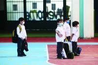 Children, teachers return to on campus school in Kuwait