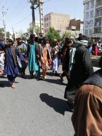 The Taliban dragged accused thieves through the streets with nooses around their necks and faces painted black