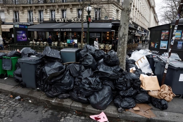 Garbage piles up at train station in southern France as janitorial workers extend strike