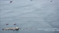 Oil slick from half-sunken ship in Gibraltar reaches Spanish beach