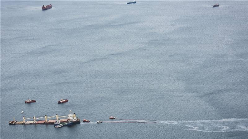 Oil slick from half-sunken ship in Gibraltar reaches Spanish beach
