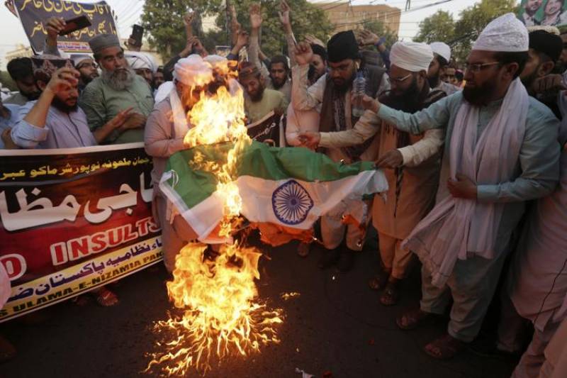 Pakistanis rally to denounce India over remarks about Islam