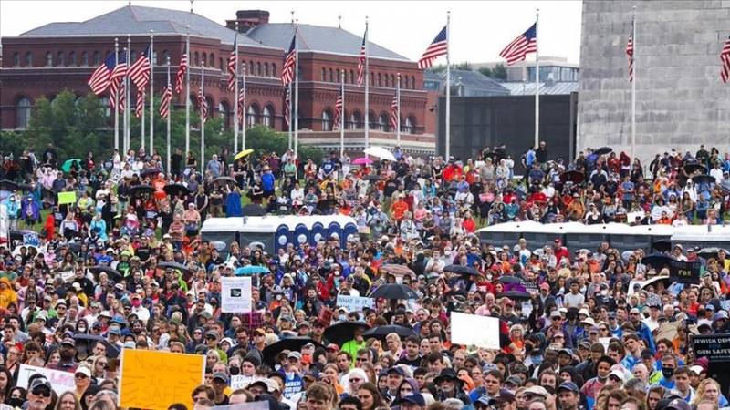 Tens of thousands rally across US against gun violence