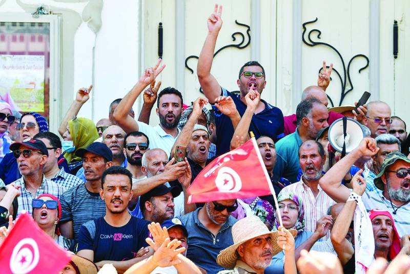 Tunisians slam reform plans, judicial purge