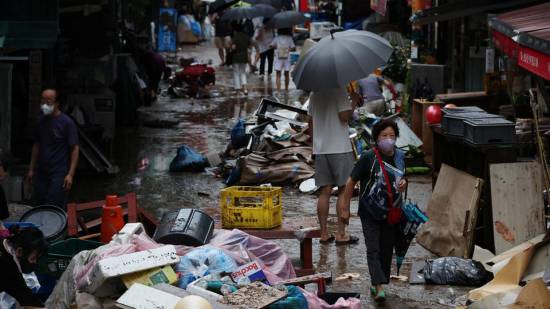 Death toll rises from flooding in South Korea, torrential rains lessen