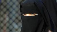 Swiss vote to ban face coverings in public