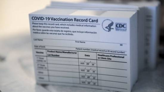 US pharmacist arrested for selling vaccine cards on eBay