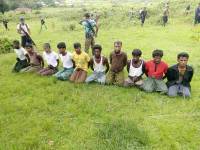 Rohingya arrested at sea shunted back to Myanmar camps