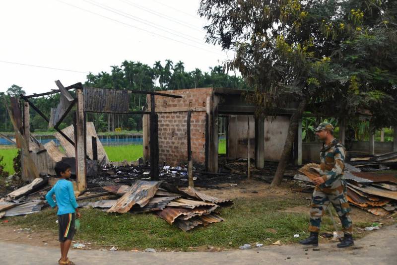 Indian violence leaves burned Muslim homes, shops