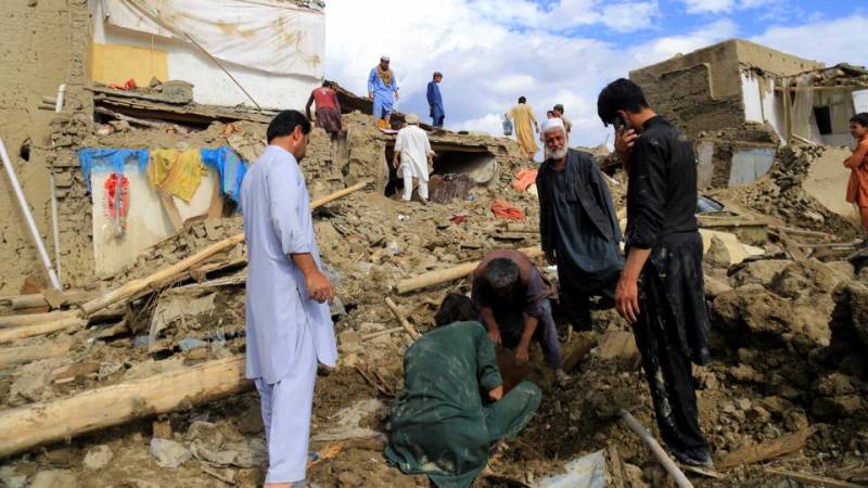 Afghanistan calls for help as floods kill scores, destroy homes