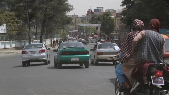 Afghans pour out in Kabul to demand release of frozen reserves