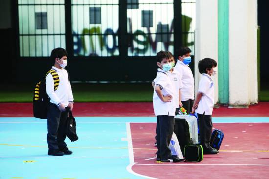 Children, teachers return to on campus school in Kuwait