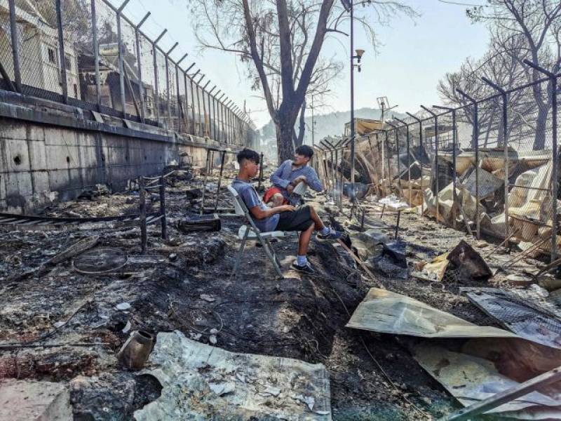 Fire destroys refugee camp on Greek island, leaves thousands homeless