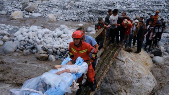 Rescuers scour for survivors as powerful quake kills dozens in China