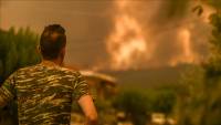 Blazes consume Greek island forests, more forced to flee