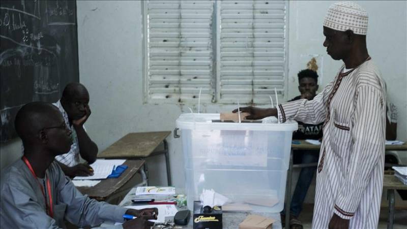 Ruling coalition claims Senegal election win as opposition disputes early results